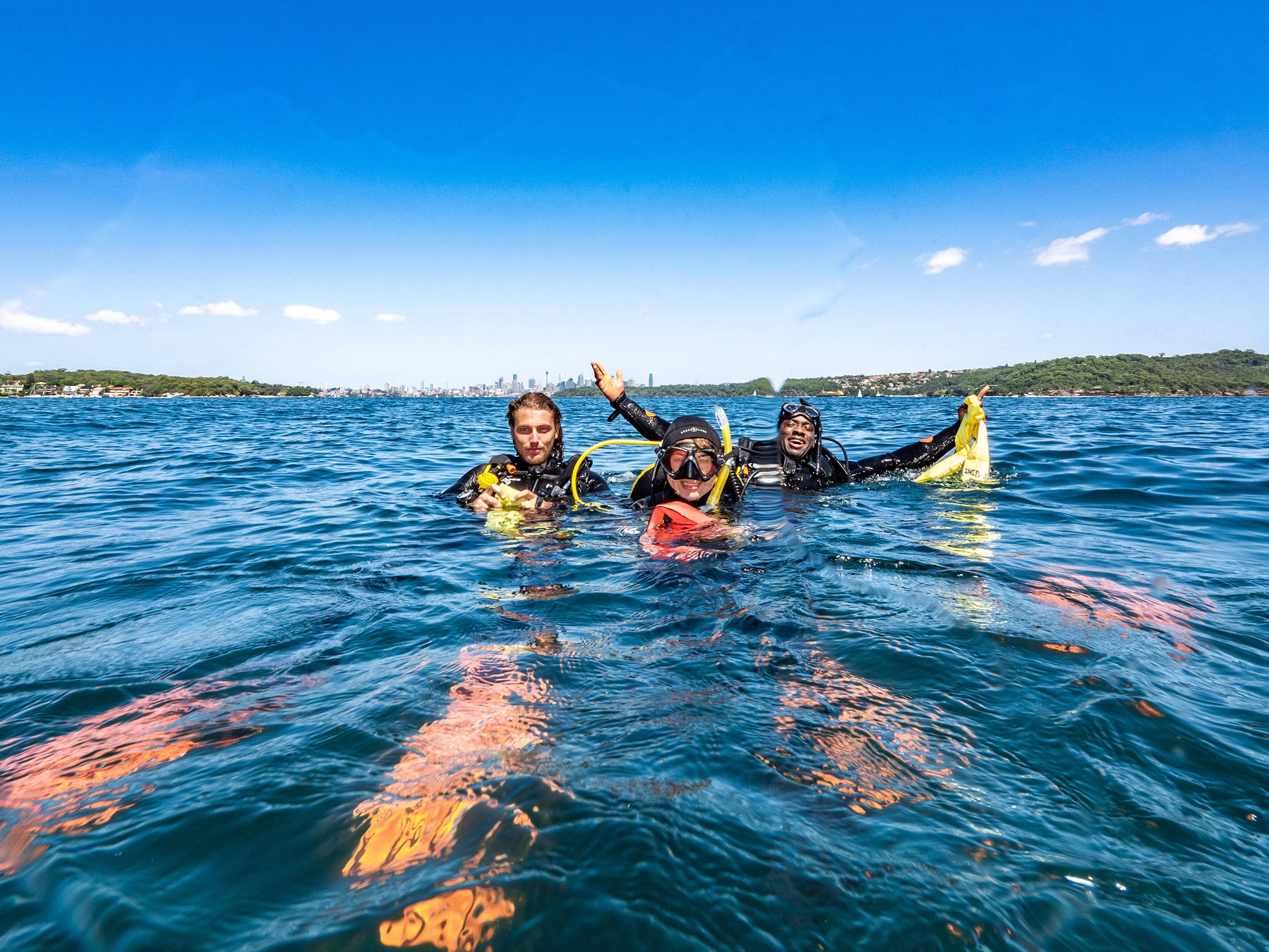Group of scuba divers in sydney doing a PADI diving course